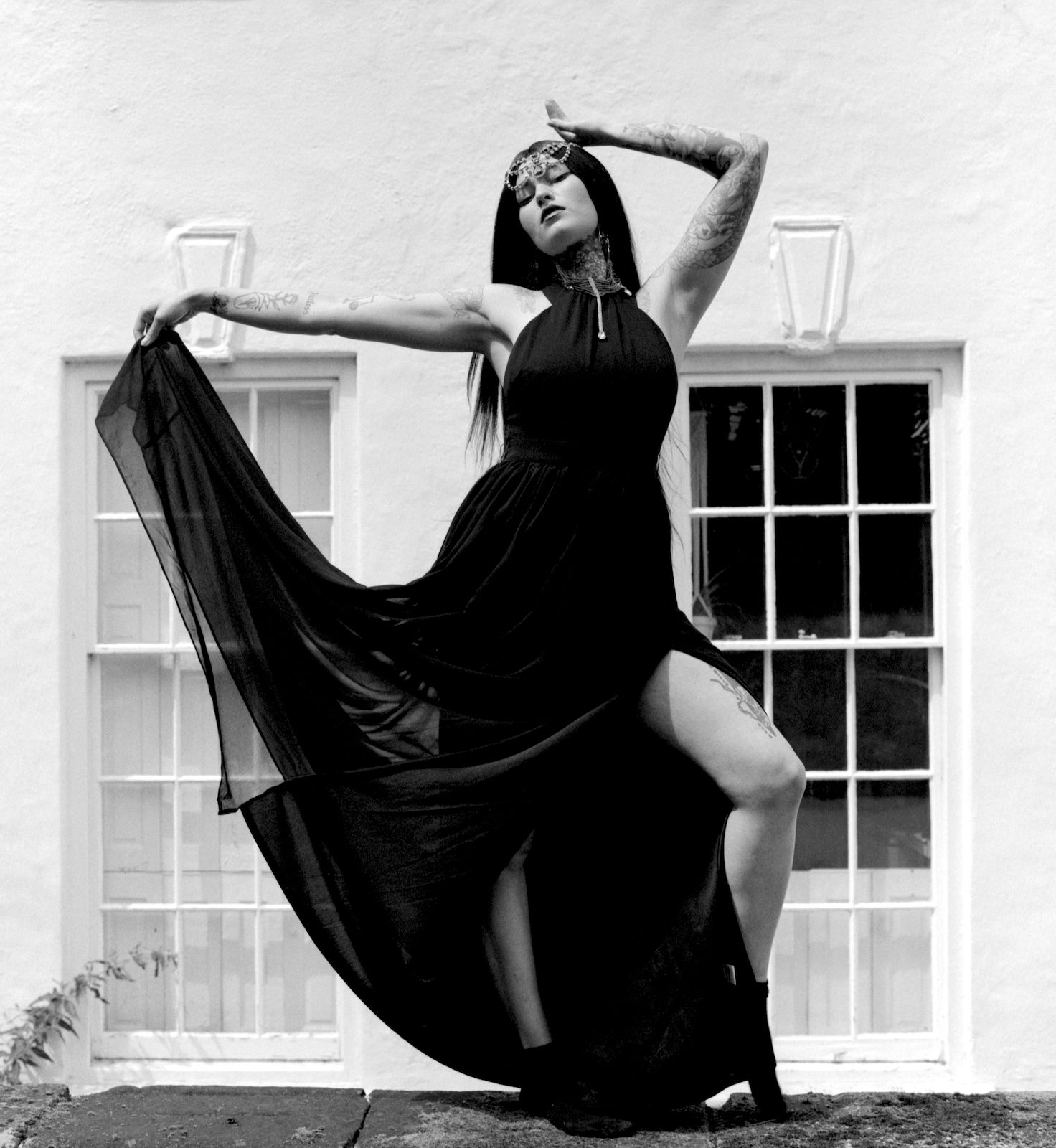 Fashion Photograph of model Ana Maria Georgia during Shoot 4 of Project Vampirique (#projectvampirique) showing a black dress outdoors