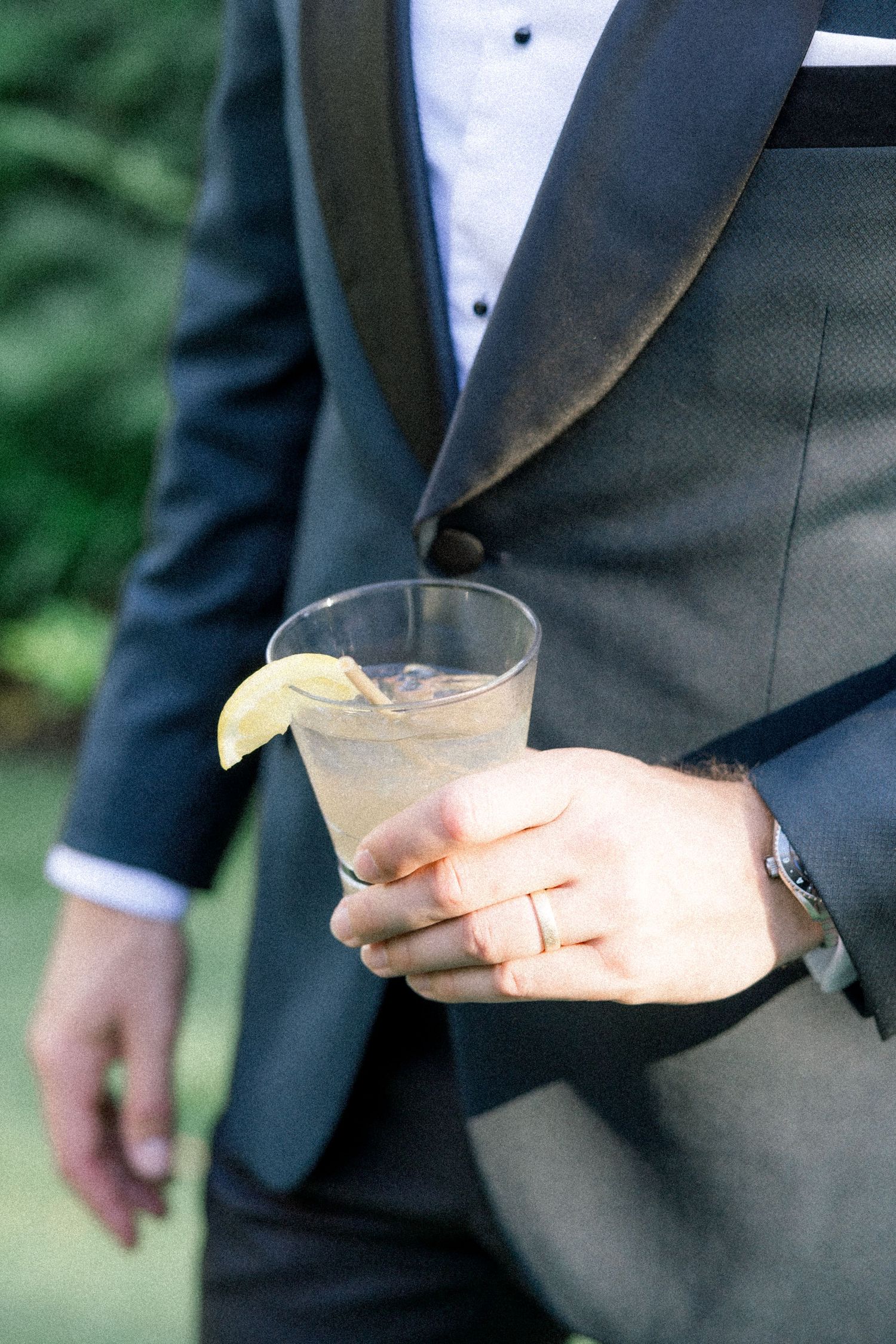 A series of romantic wedding photos showing a couple embracing while wearing formal attire outdoors.