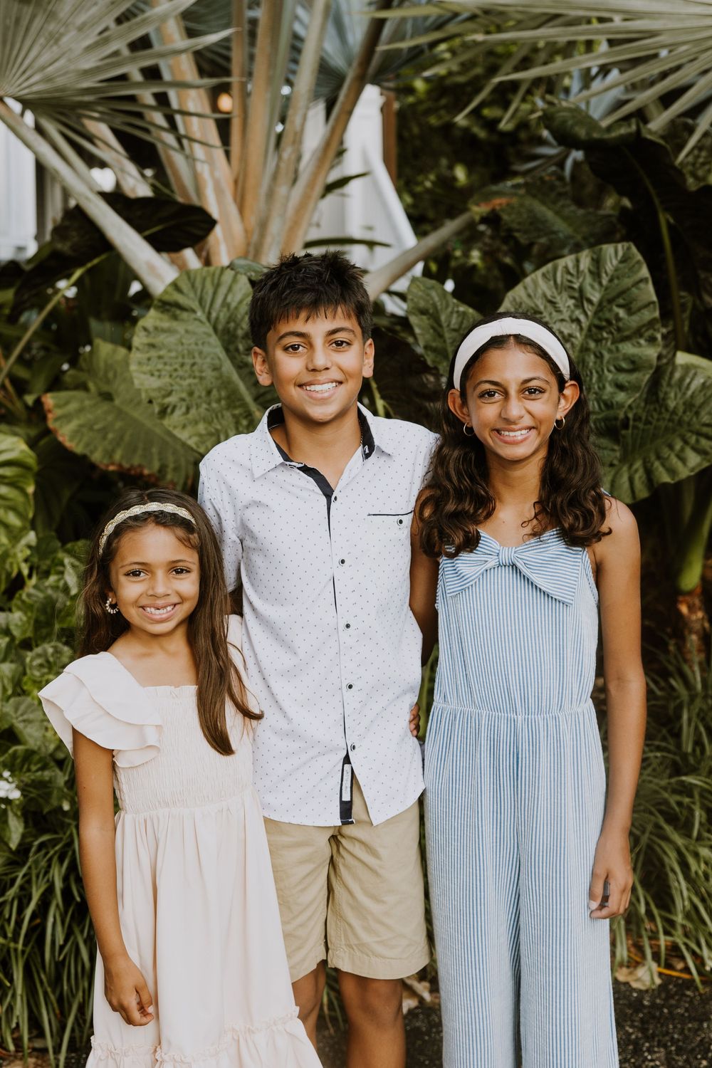 Golden hour summer family photos captured by Lindsay McDow Photography on Lake Trail on Palm Beach Island
