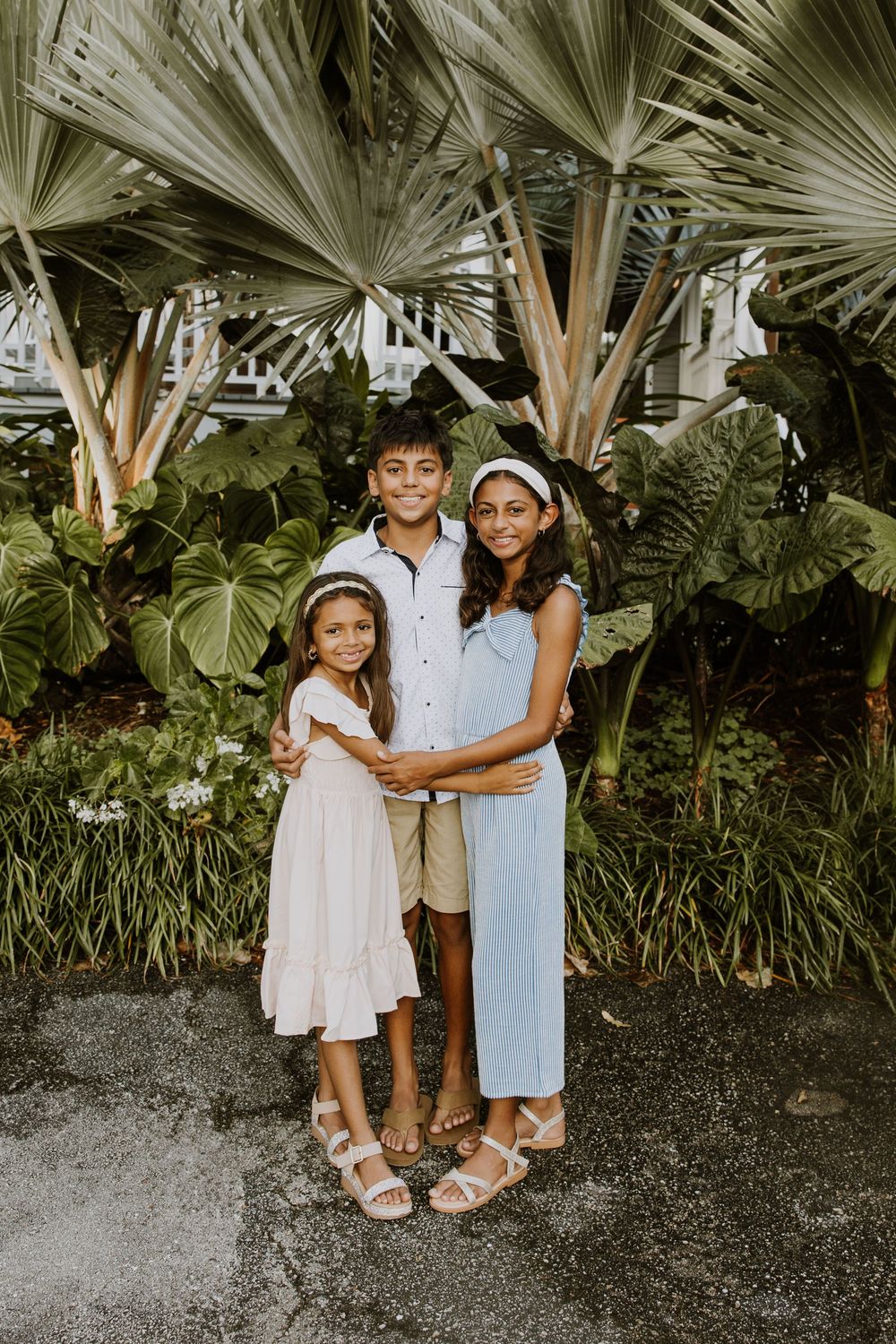 Golden hour summer family photos captured by Lindsay McDow Photography on Lake Trail on Palm Beach Island