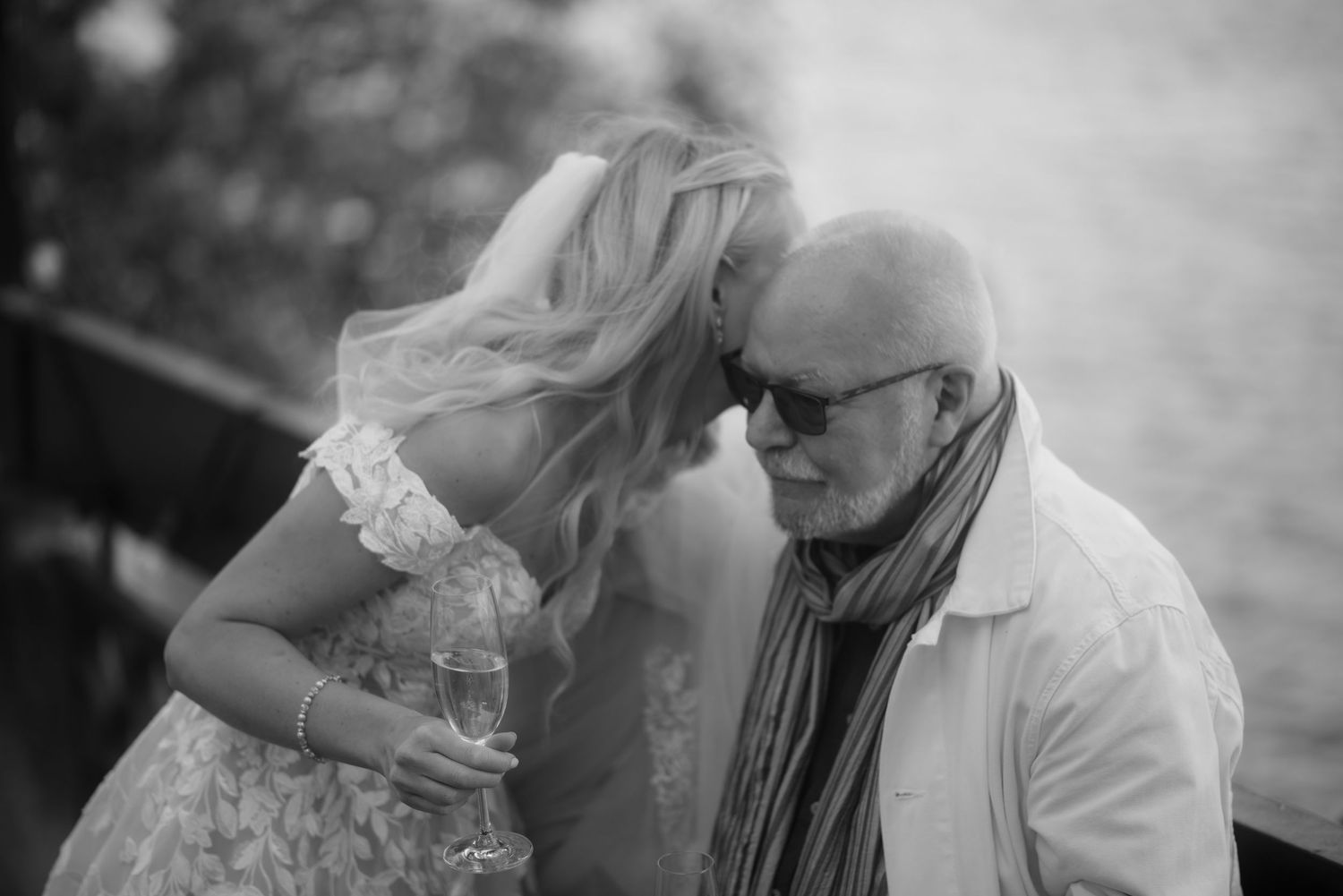 An intimate moment shared between family members during wedding celebrations.