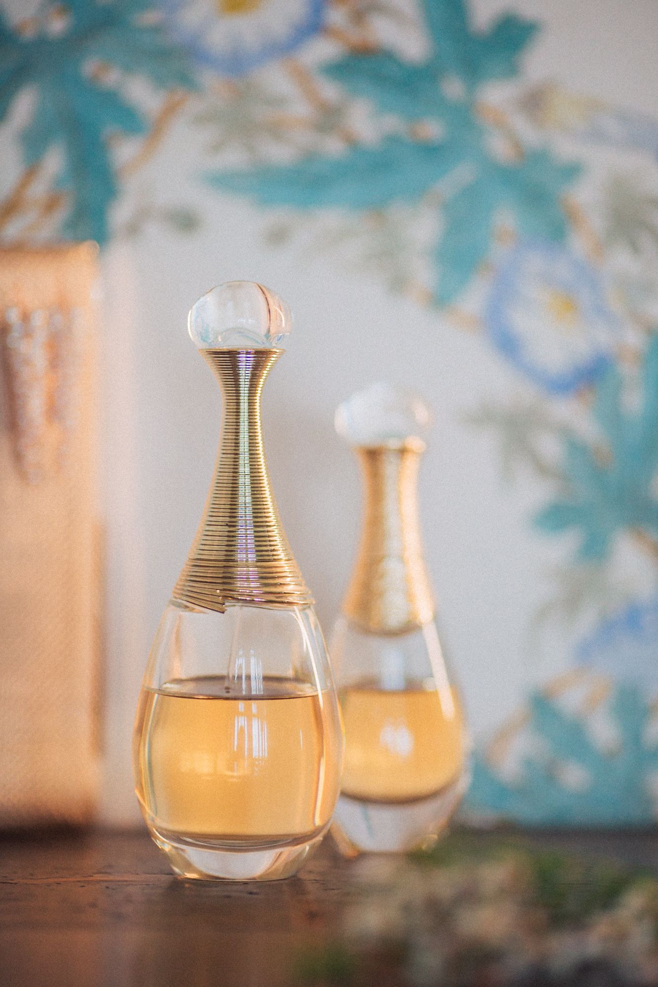 brides perfume displayed in an elegant French-style room at Casa dos Penedos. Captured by a destination wedding photographer in Lisbon