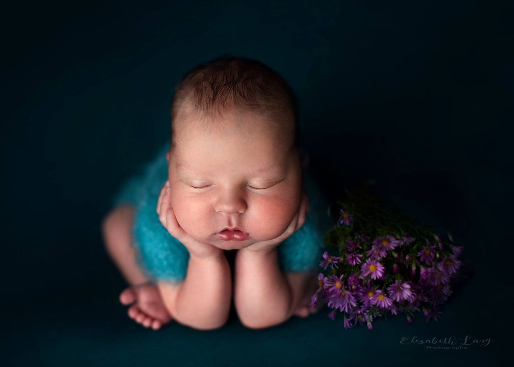Newborn baby girl froggy pose from Elizabeth Lang Photography in Surrey.