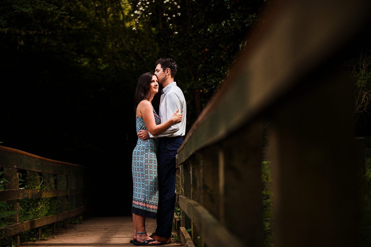 couple hugging, lady looking into distance