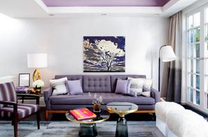 Regal Tree by Lisa Drew photo artist represented on wall in living room