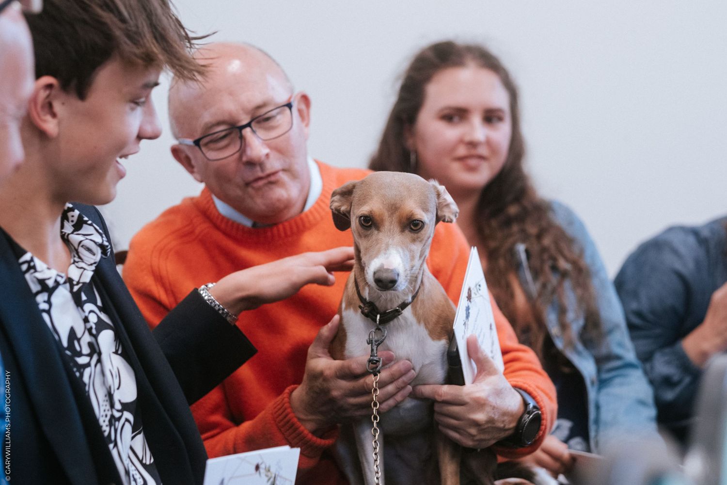 Documentary wedding photography of a dog at Sutton St. James Baptist Church