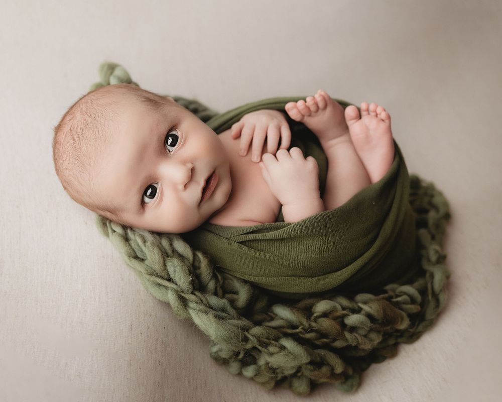 Professional newborn photo - green