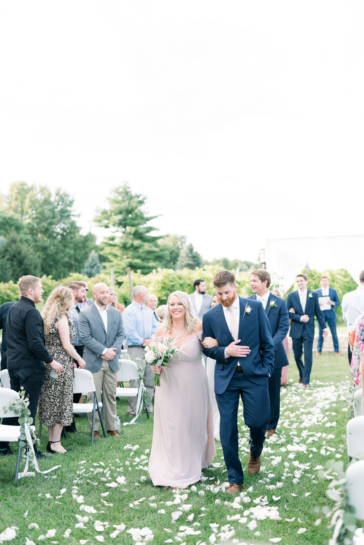 Vineyard photos with white willow events at Prairie Moon Winery wedding in Ames, Iowa