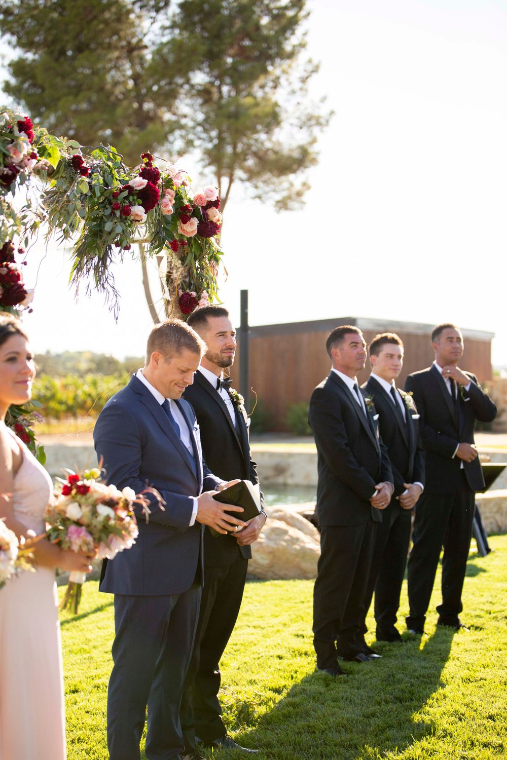 groom at alter at Rava Winery