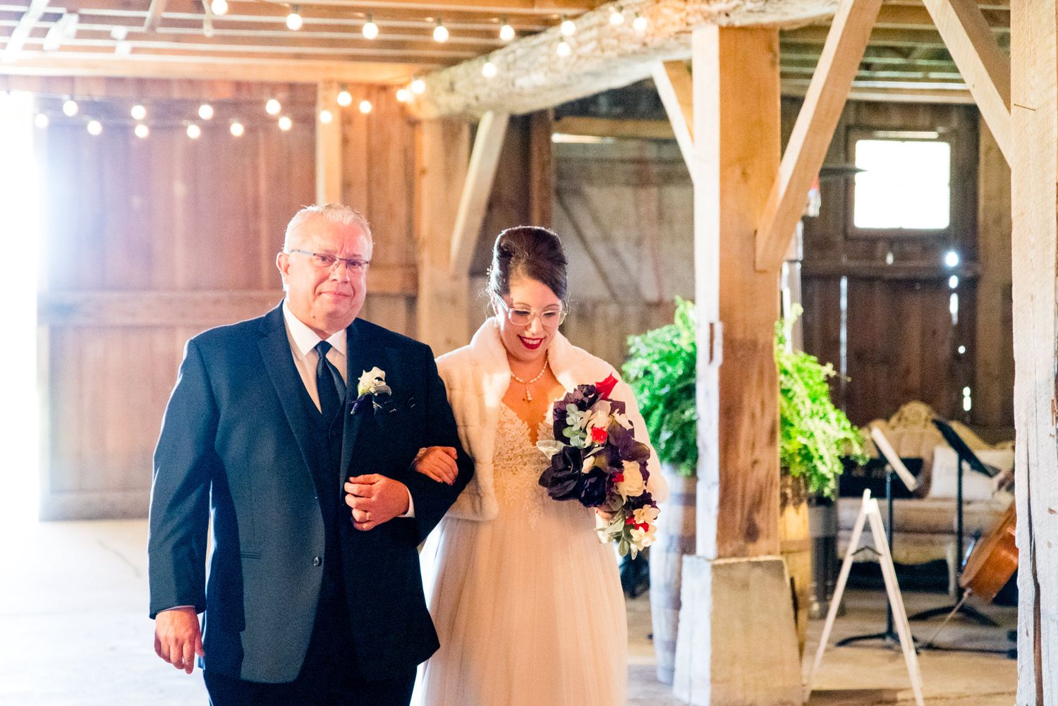 bride and groom walking down the aisle at Shepard's Place barn wedding in Ohio