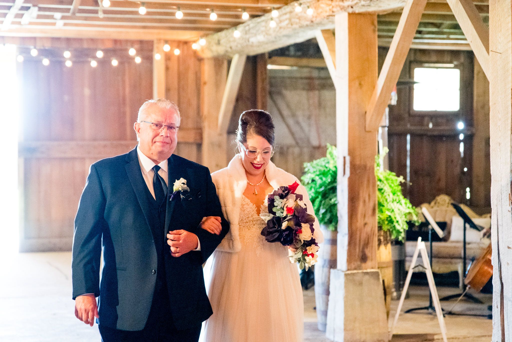 bride and groom walking down the aisle at Shepard's Place barn wedding in Ohio