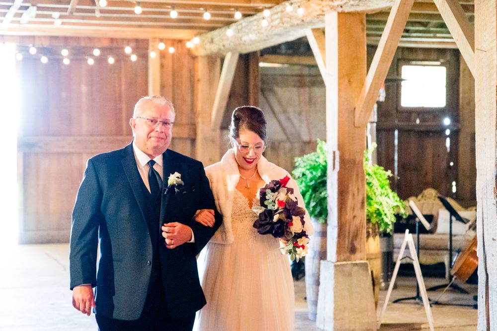 bride and groom walking down the aisle at Shepard's Place barn wedding in Ohio
