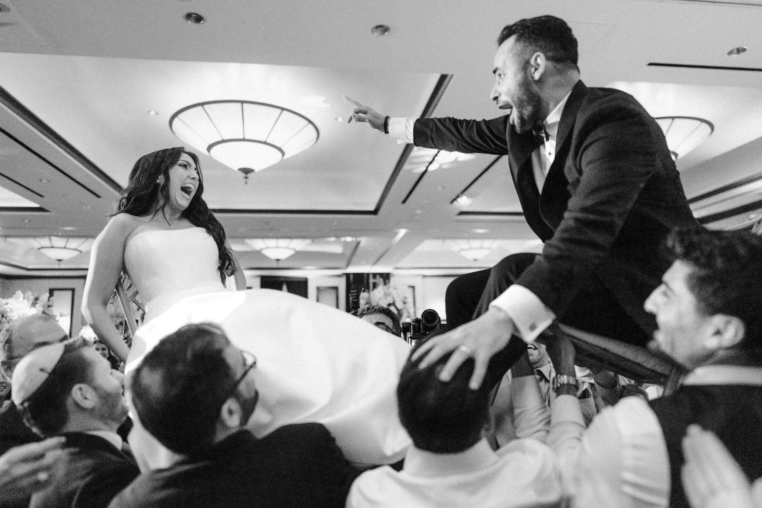 Hora Dance jewish wedding, Chuppah ceremony at Temple Emmanuel NJ jewish wedding photographer by Benjamin Kohen
