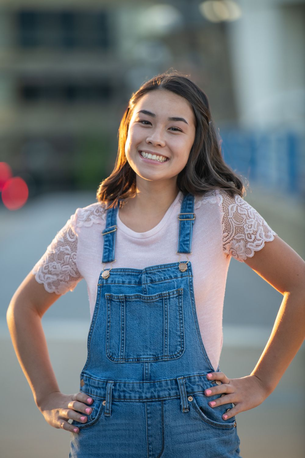 Senior girl in overalls