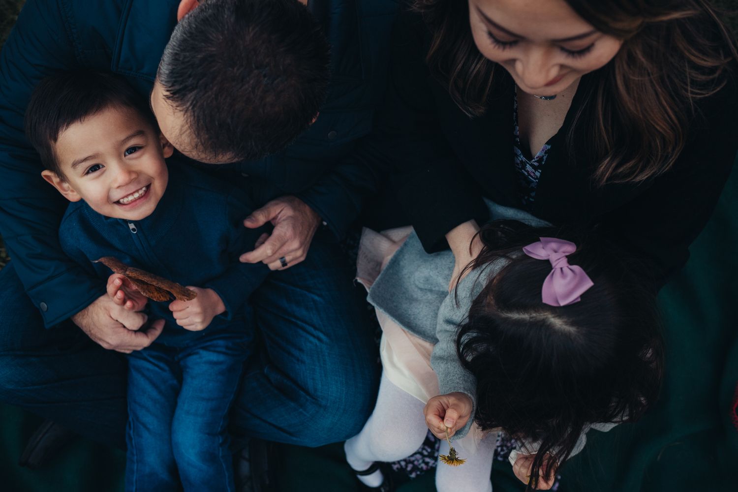 family of four tickling and snuggling for family photography at confluence park in Issaquah, WA by Shutterbabe Snaphots