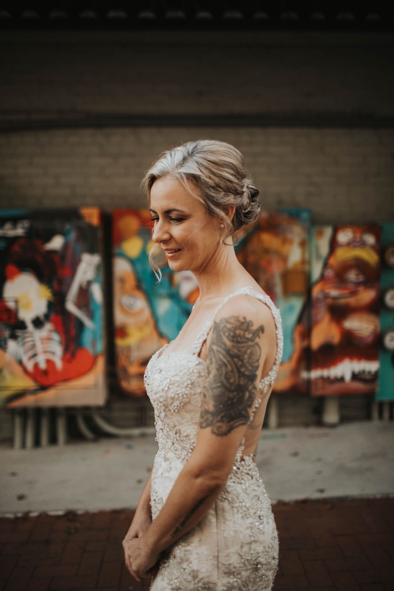 Bridal portraits in Greenville, NC outside of Uptown Brewery before intimate LGBT wedding.
