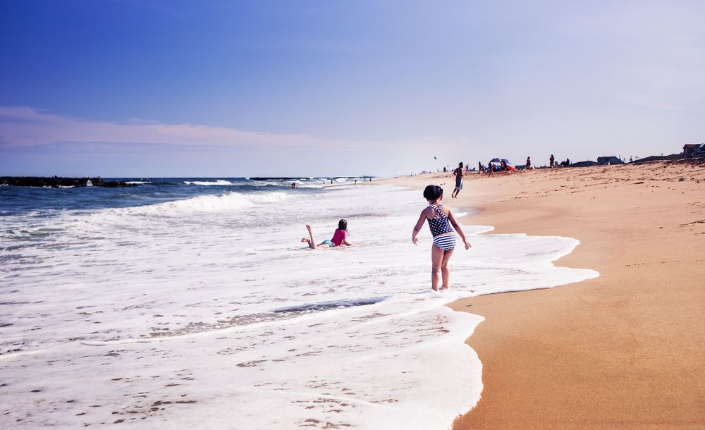 child on the beach in NY