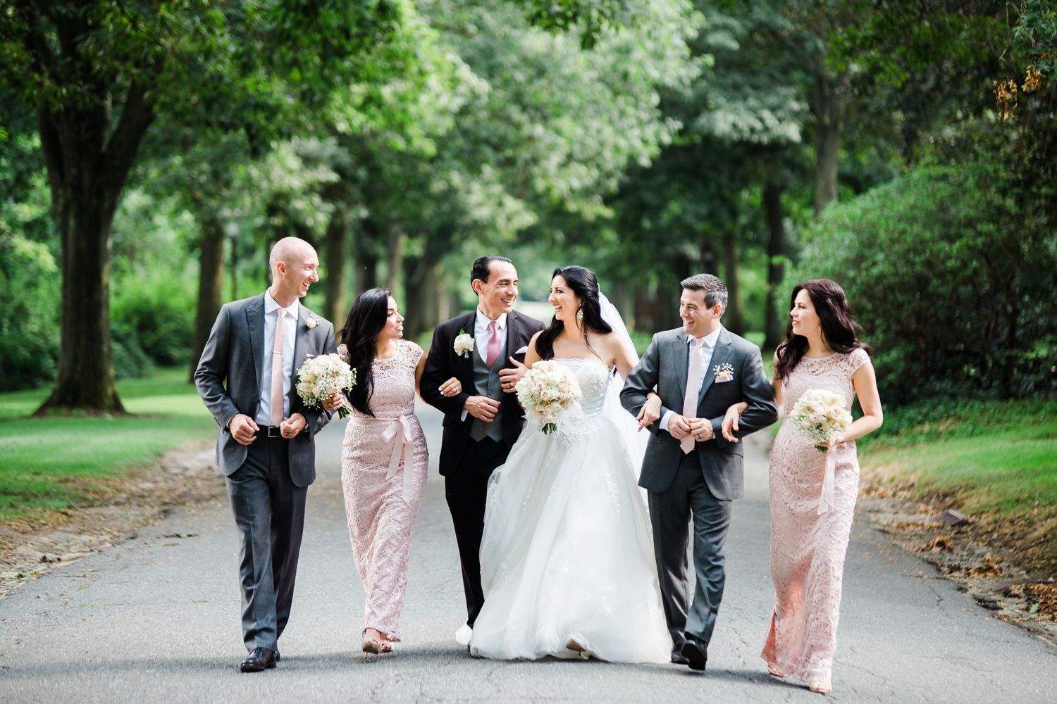 Wedding party wearing blush lace and grey at Skylands Manor
