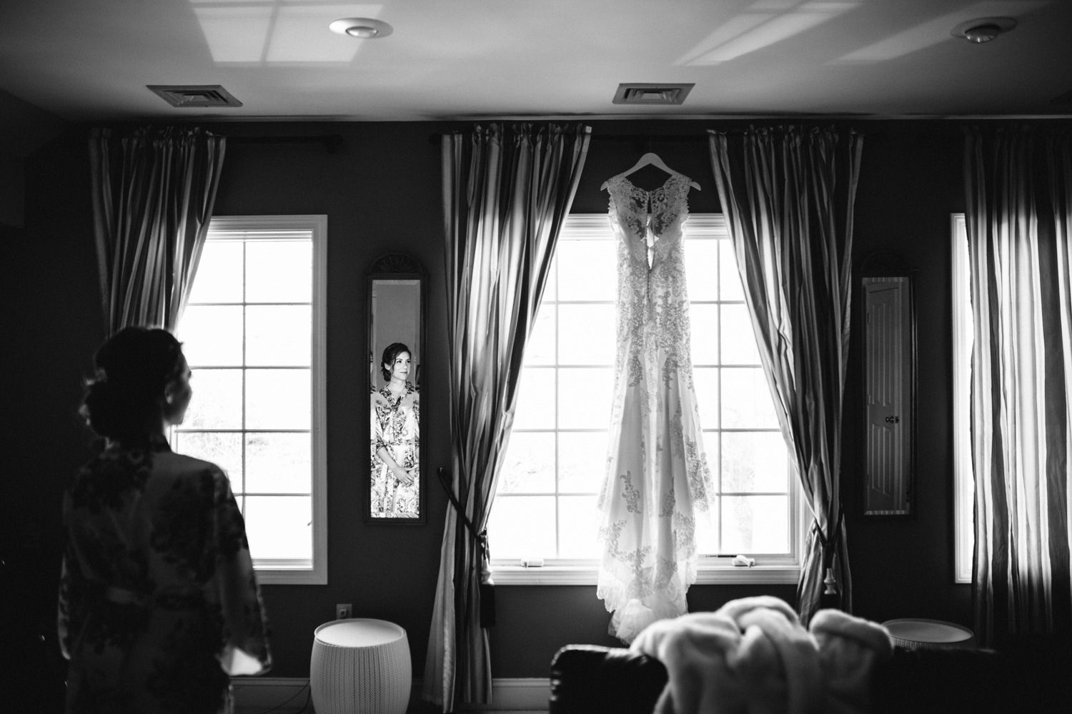 Bride looking at wedding dress