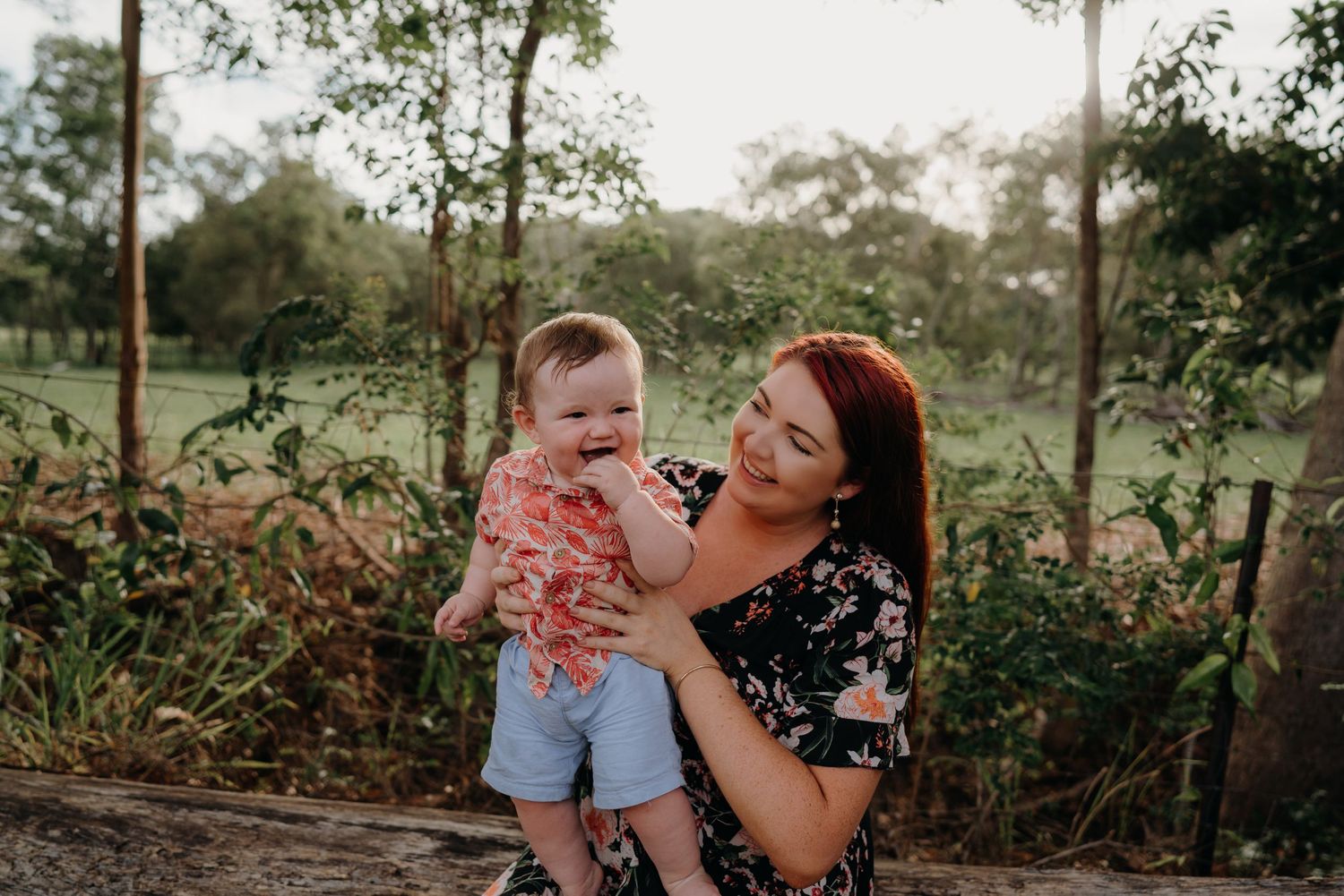 mum holding 10 month old during family photoshoot
