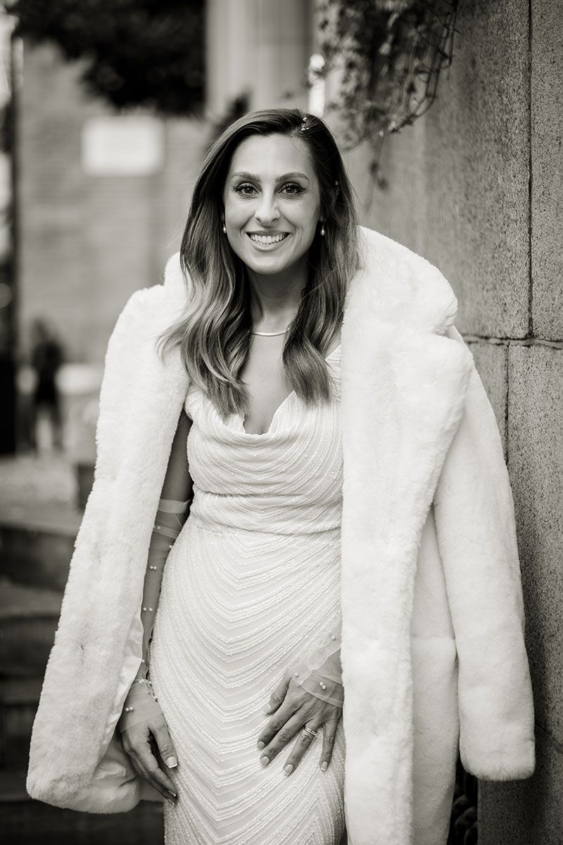 Relaxed and smiling portrait of bride, taken by Jane Nicholson Photography.