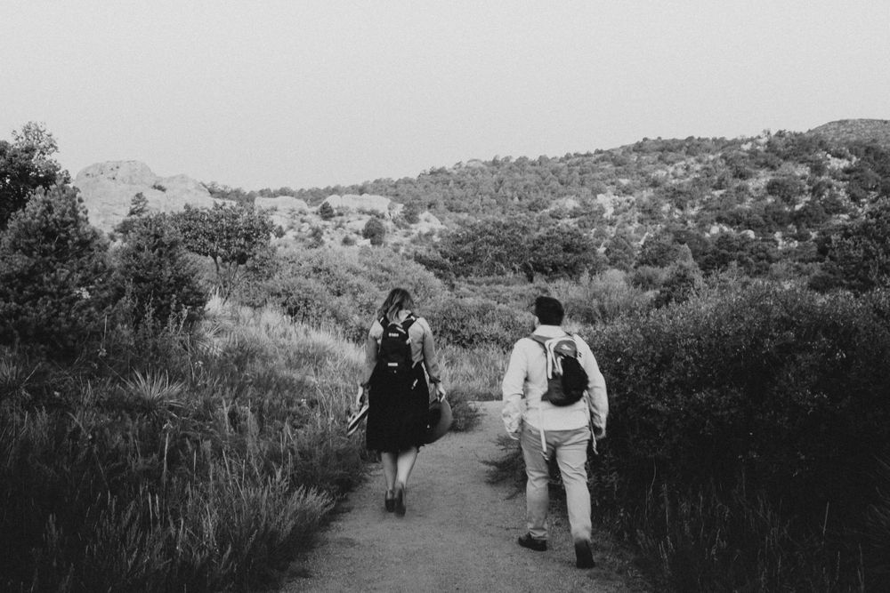 couple hiking in Denver Colorado after getting engaged