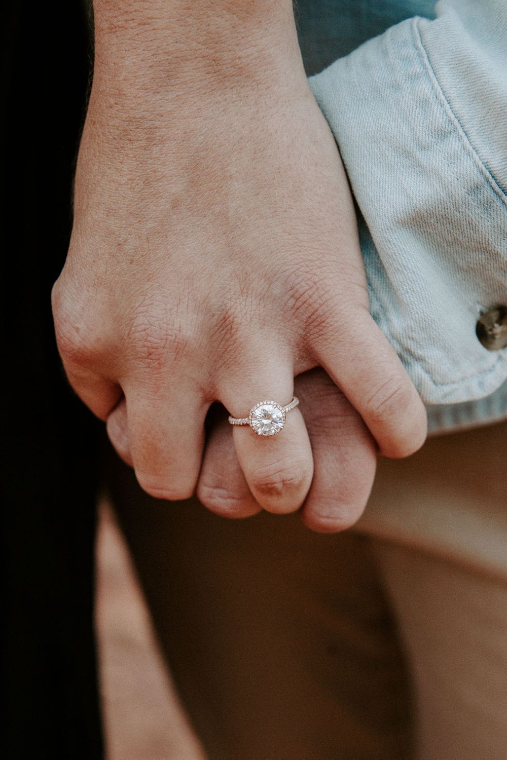 woman new engagement ring after getting engaged in garden of the gods