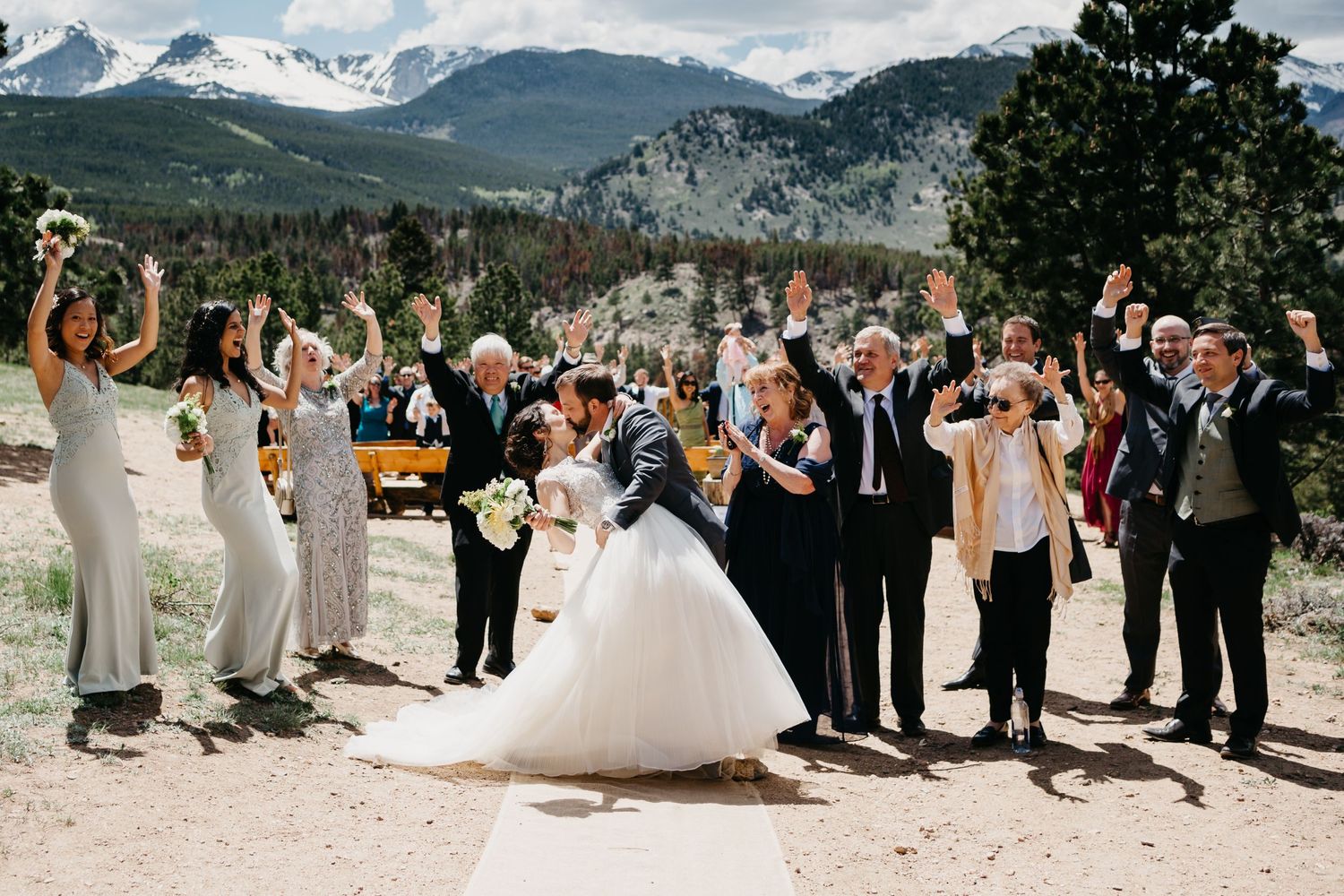 bride and groom, kiss, rmnp, ymca, ceremony, photography, colorado, estes park, forest wedding, classy, timeless