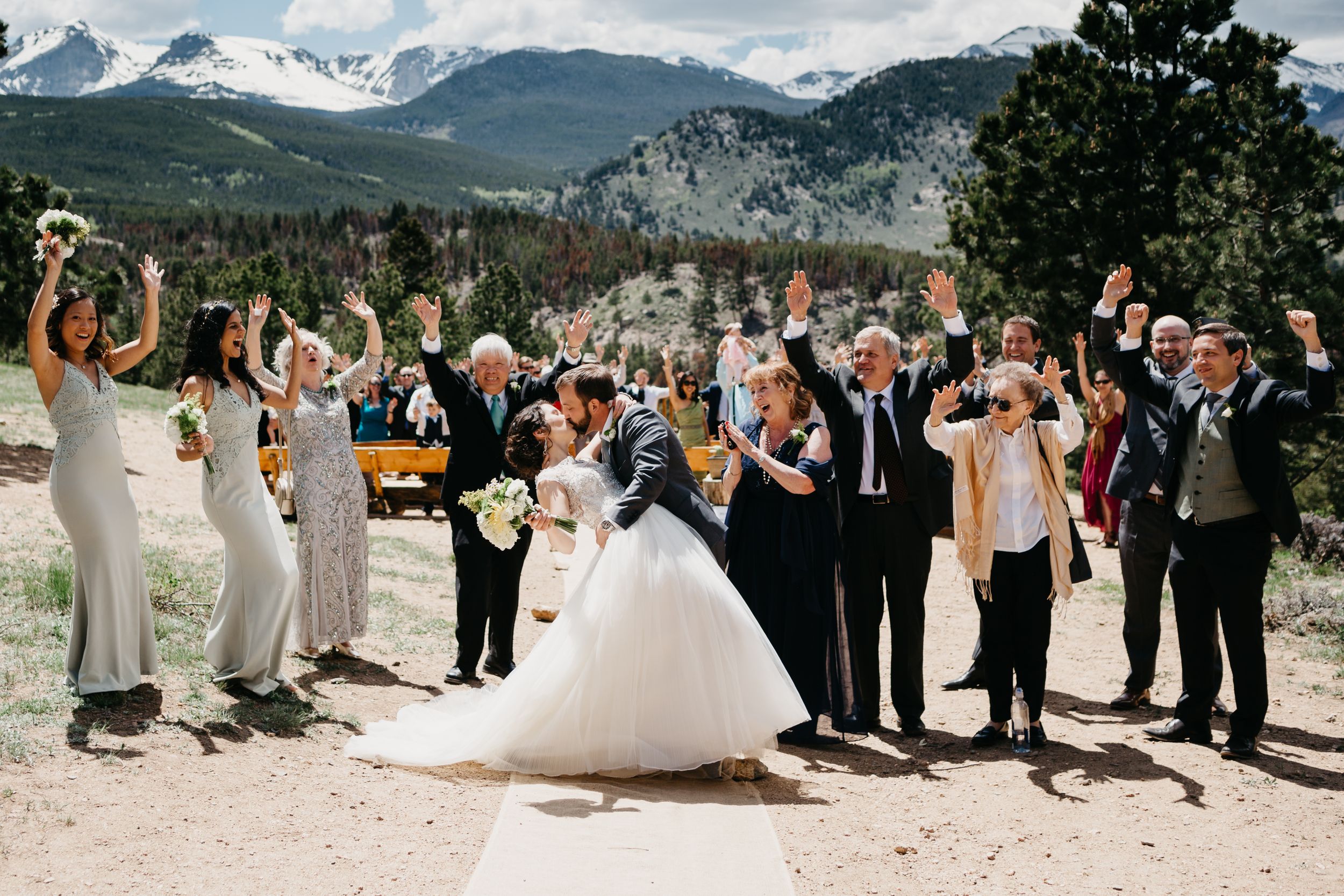 bride and groom, kiss, rmnp, ymca, ceremony, photography, colorado, estes park, forest wedding, classy, timeless