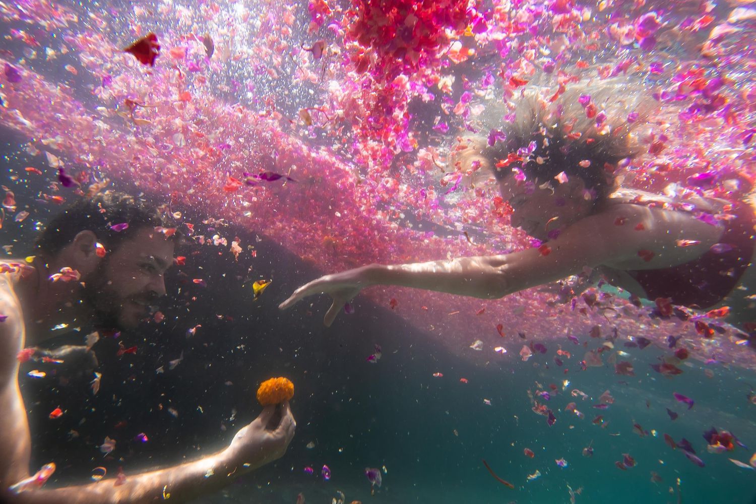 underwater remake of the sistine chapel painting with flowers
