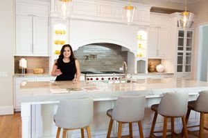 Realtor Laura Miranda preparing to show million dollar home in Houston River Oaks District