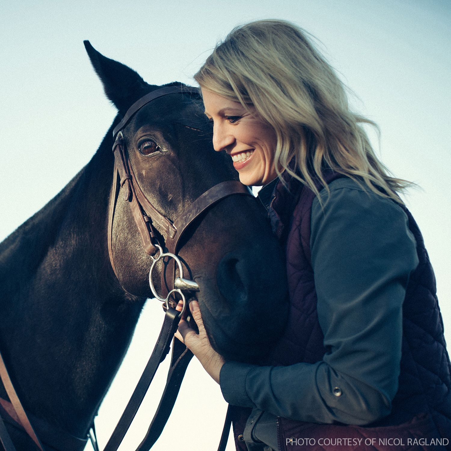 MIchelle LaVasque and thoroughbred horse