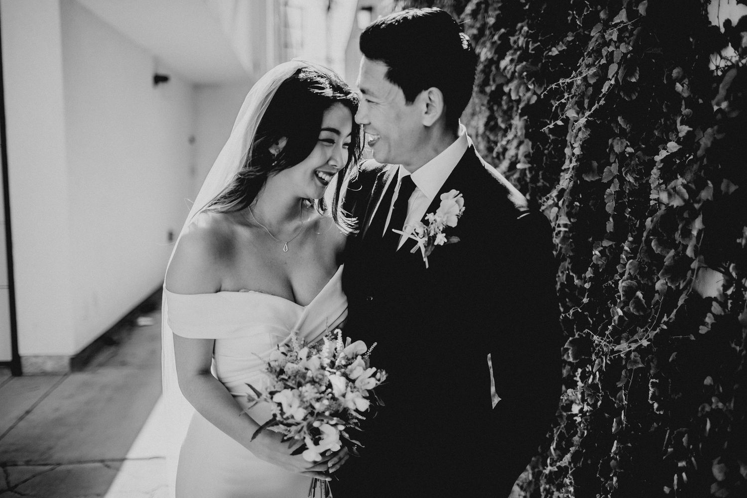 bride and groom laughing portraits near a.o.c. la