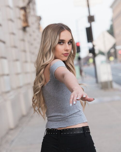 senior girl urban sidewalk