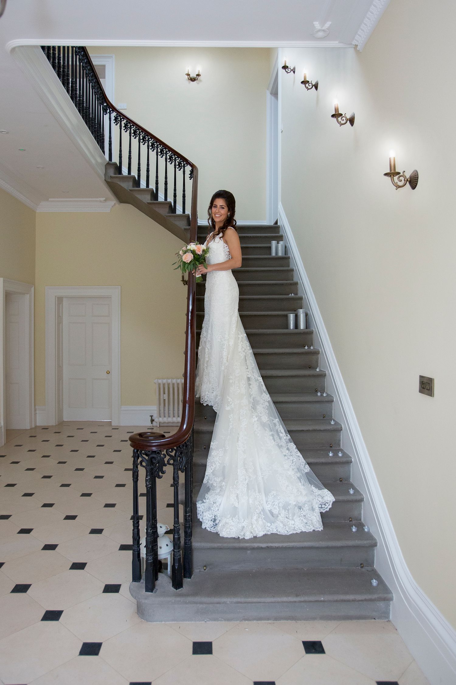 that amazing stairs with beautiful bride in her wedding dress at St Tewdrics House