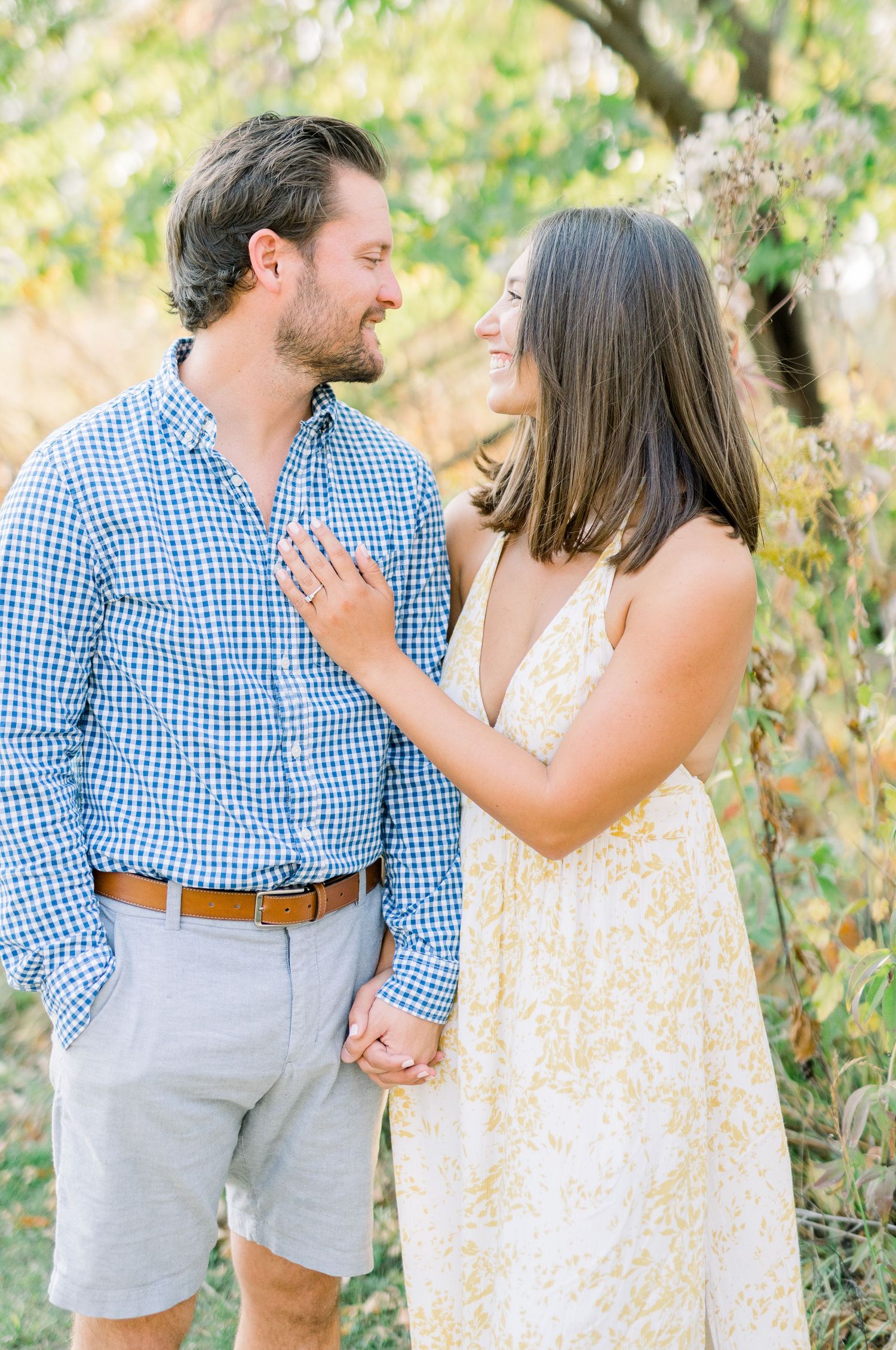 Light and airy film engagement photos in Des Moines, Iowa at downtown des moines