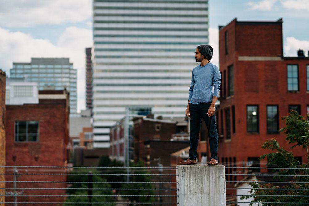 man overlooking the city of cincinnati portrait photography ohio senior dayton