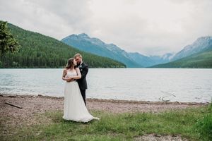 Glacier National Park elopement on the lake shore with mountain views