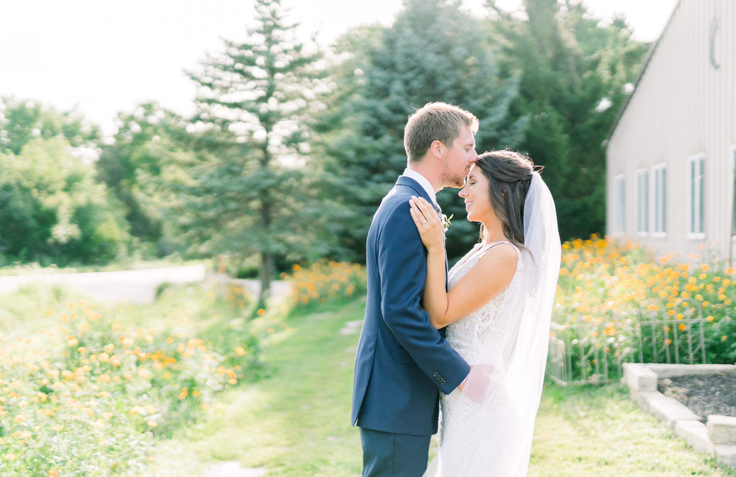 Vineyard photos with white willow events at Prairie Moon Winery wedding in Ames, Iowa