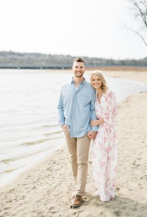 Light and airy film lakeside dock engagement session at Gray's Lake in Des Moines, Iowa