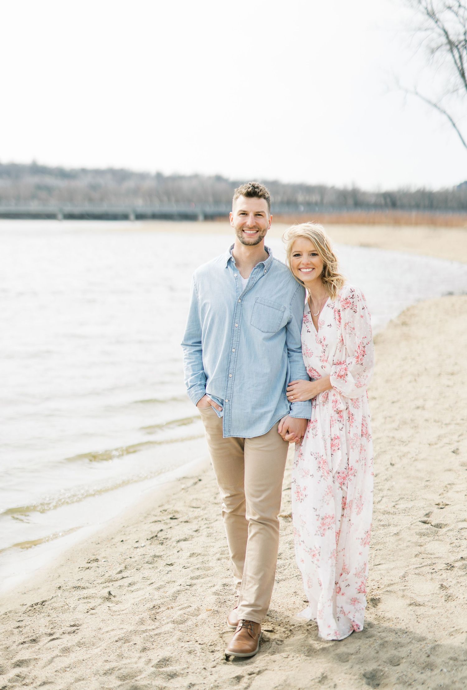 Light and airy film lakeside dock engagement session at Gray's Lake in Des Moines, Iowa