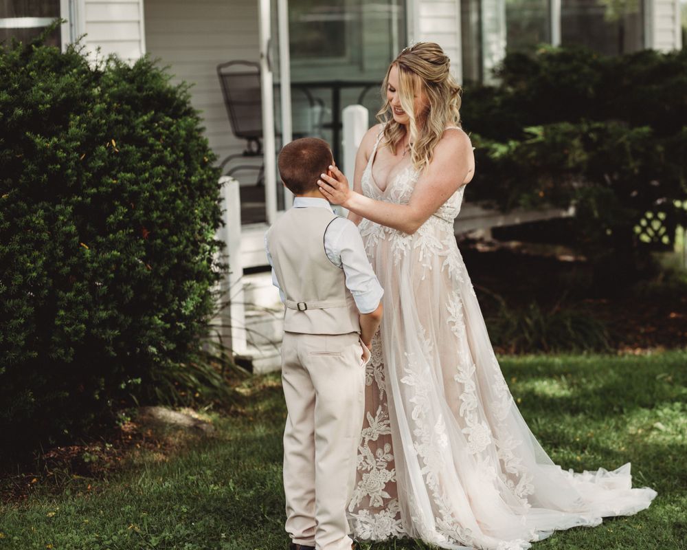 Professional wedding photo - first look with son