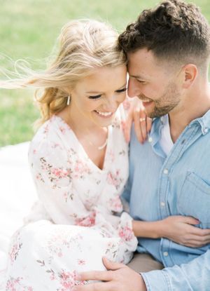 Light and airy film lakeside dock engagement session at Gray's Lake in Des Moines, Iowa