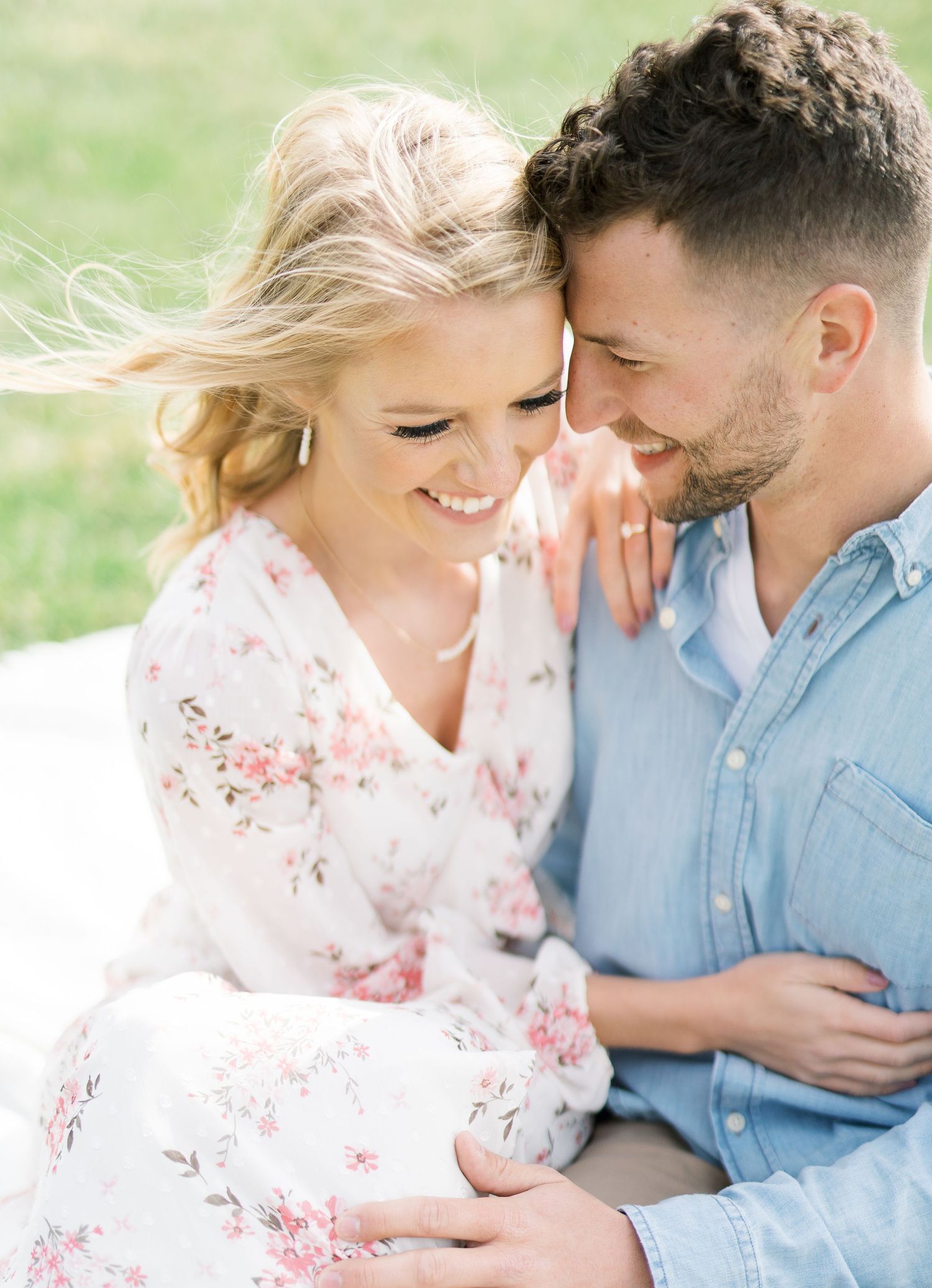 Light and airy film lakeside dock engagement session at Gray's Lake in Des Moines, Iowa