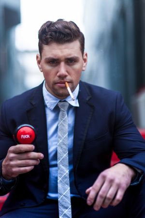 Actor Christian James Smoking in Suit Men's Fashion Trends Handball Court Venice Beach Interview Magazine