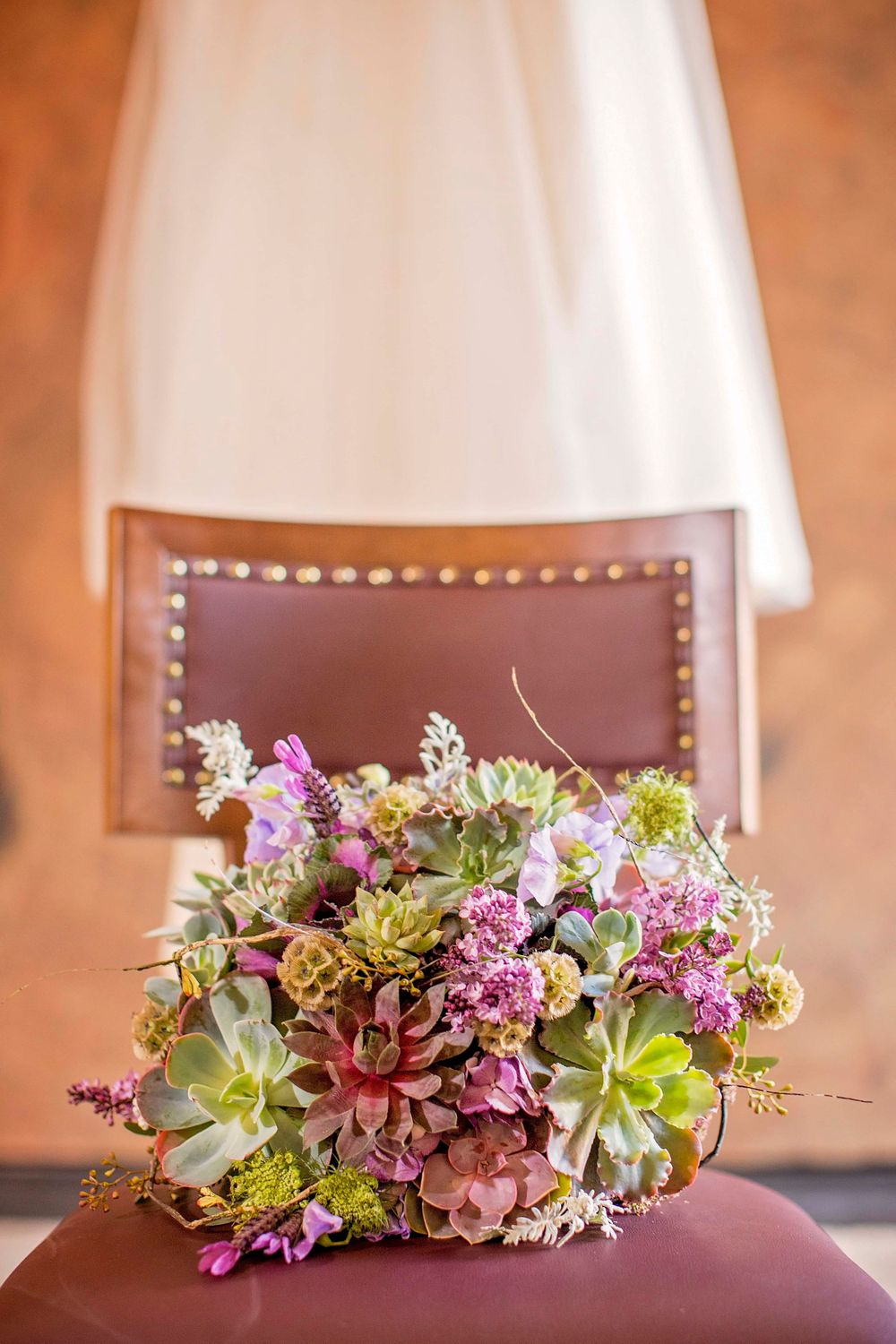 Wedding dress and bridal bouquet at Allegretto Vineyard Resort