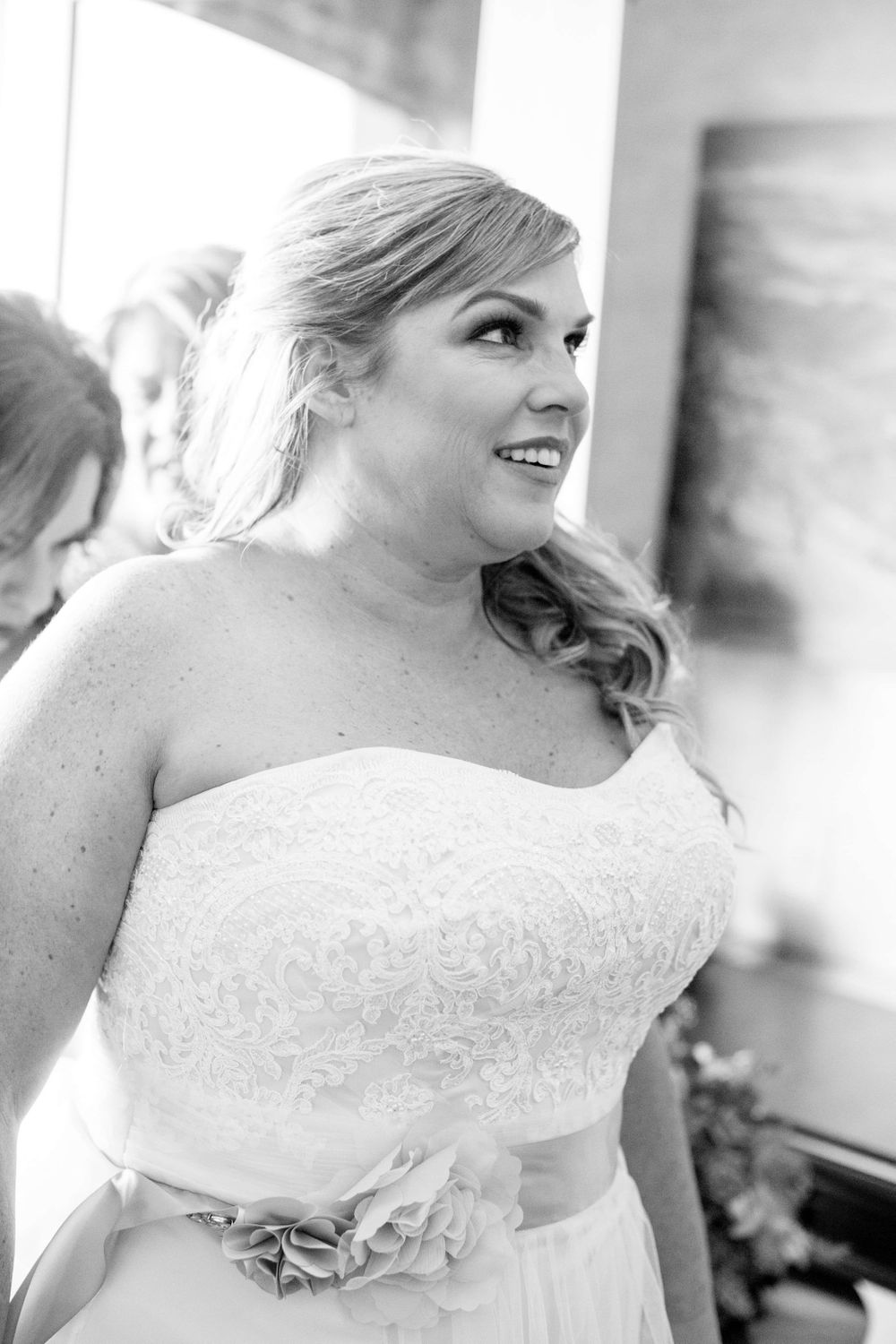 bride getting dressed at Allegretto Vineyard Resort