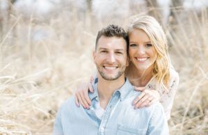 Light and airy film lakeside dock engagement session at Gray's Lake in Des Moines, Iowa