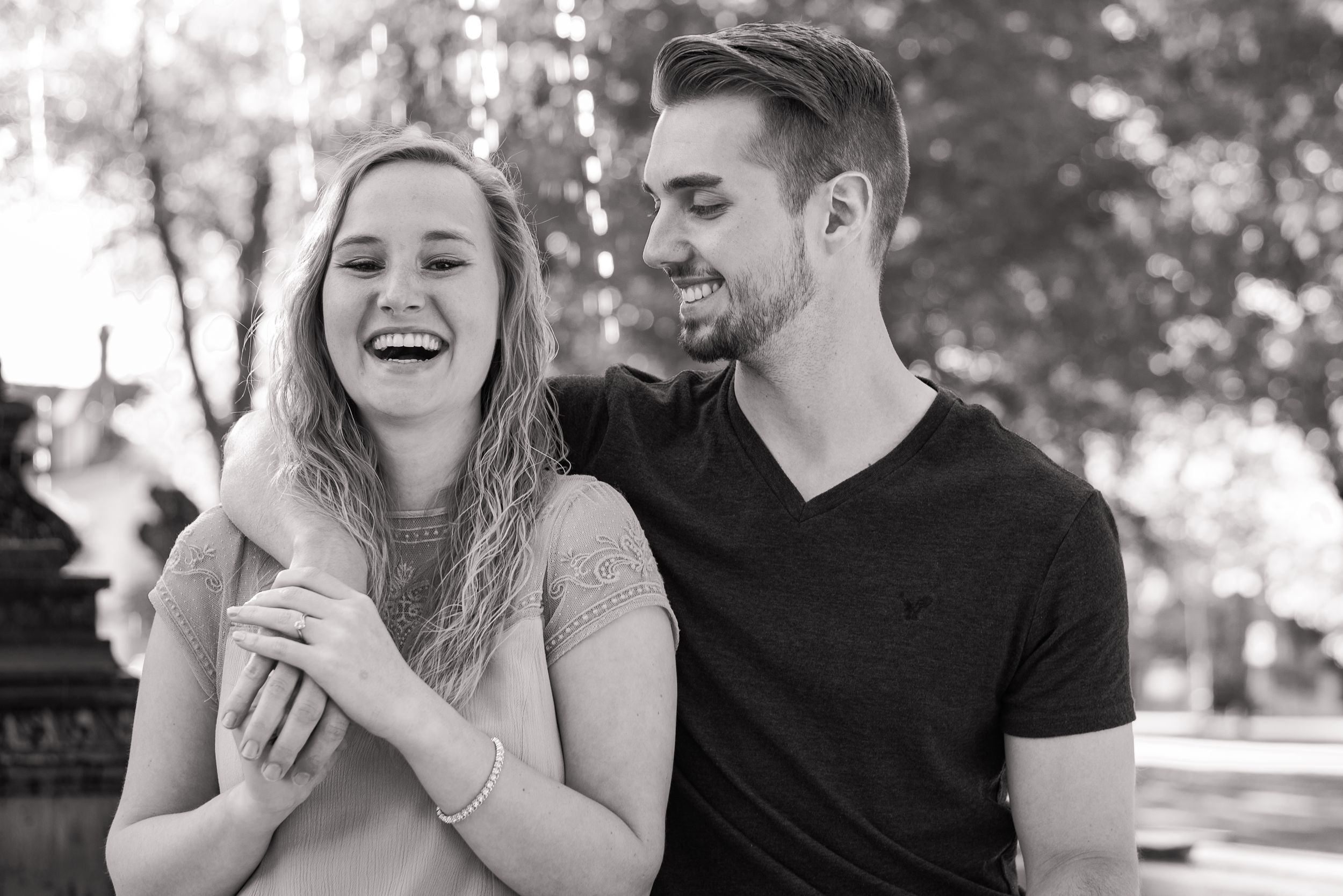 Couple laughing in black and white for engagement in Franklin Pennsylvania