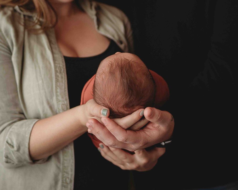Professional newborn photo with mom